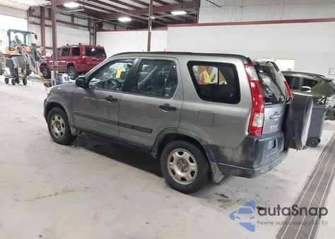 2006 Honda Cr-V Lx z USA, uszkodzony, nr VIN JHLRD785X6C053853